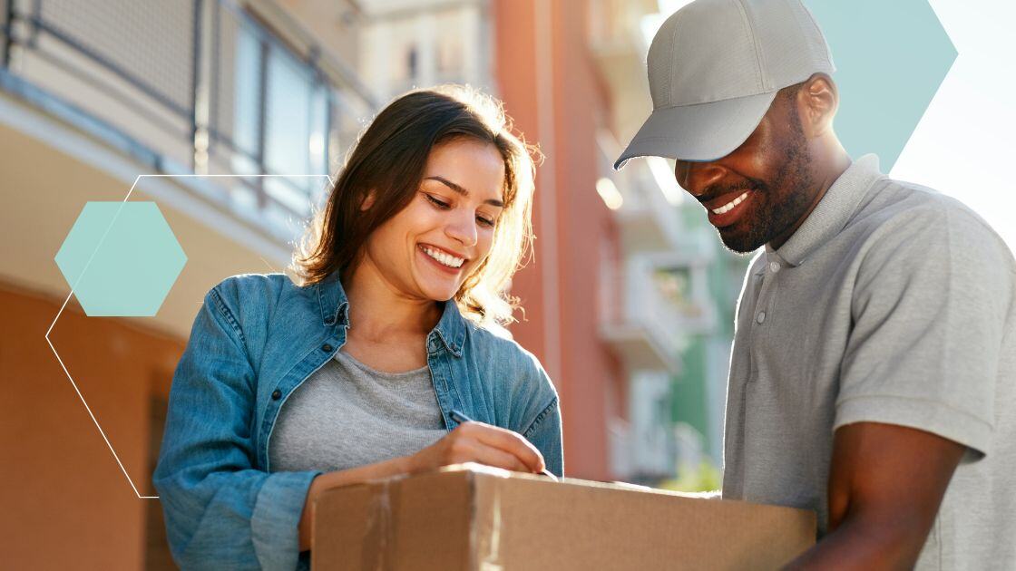 Two people exchanging a package