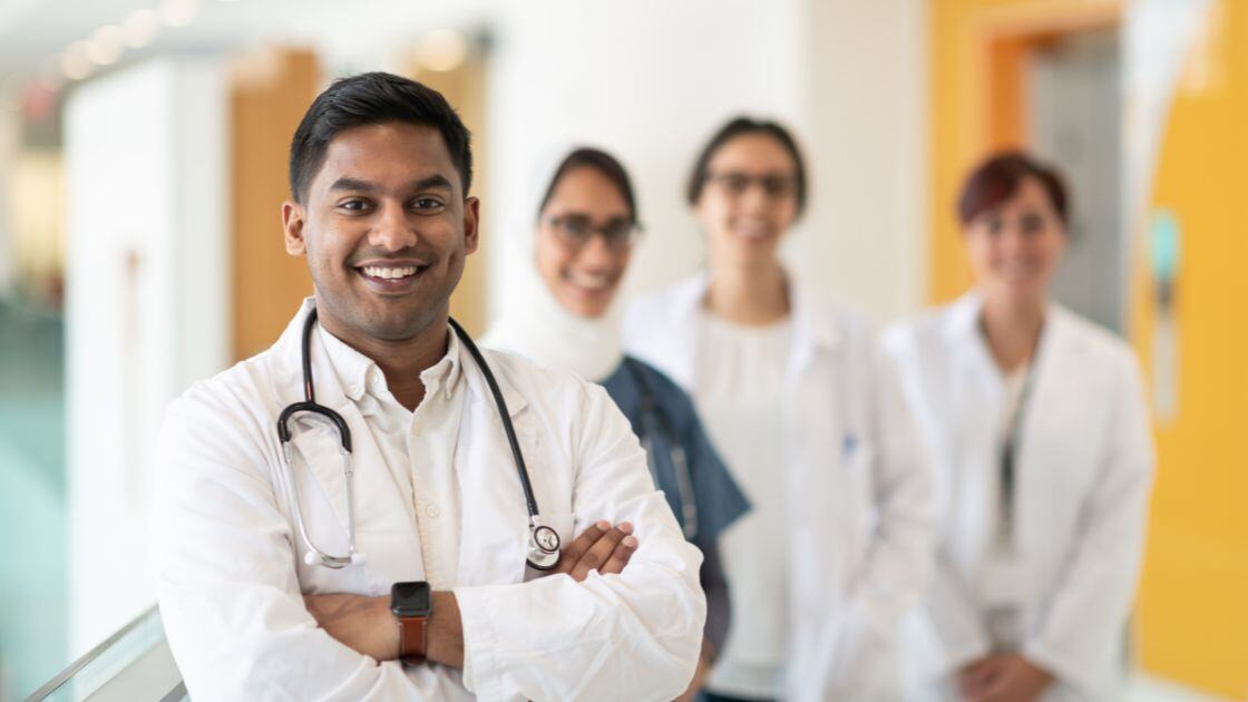 Medical doctor with staff