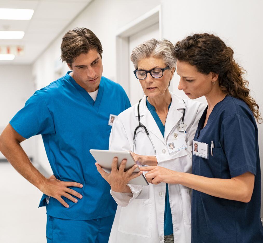 nurses speaking with a primary care physician